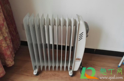 电取暖器冬天刚开时候散热片有响声(电暖器发出响声)