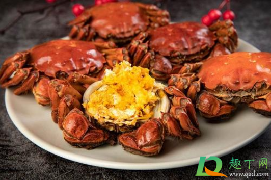 螃蟹挑选白肚还是黑肚(螃蟹肚子黑黑的是什么)