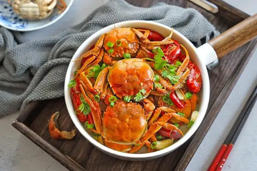 螃蟹和牛奶一起吃会中毒吗(螃蟹配牛奶会中毒吗)