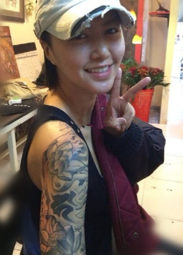 谭维维是哪一届的超女？谭维维纹身花臂是什(谭维维出道时的超女)